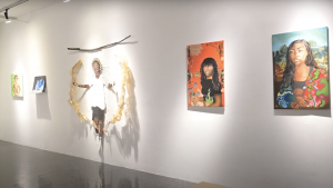 View of gallery at the Anderson showing student paintings and sculptures
