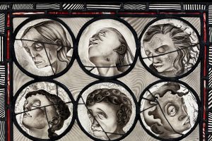 A close up photo of a stained glass window. There are two rows of three circles with illustrated human heads inside the circles. The heads are looking in various directions.