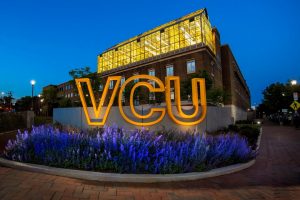 VCU building lit up at night