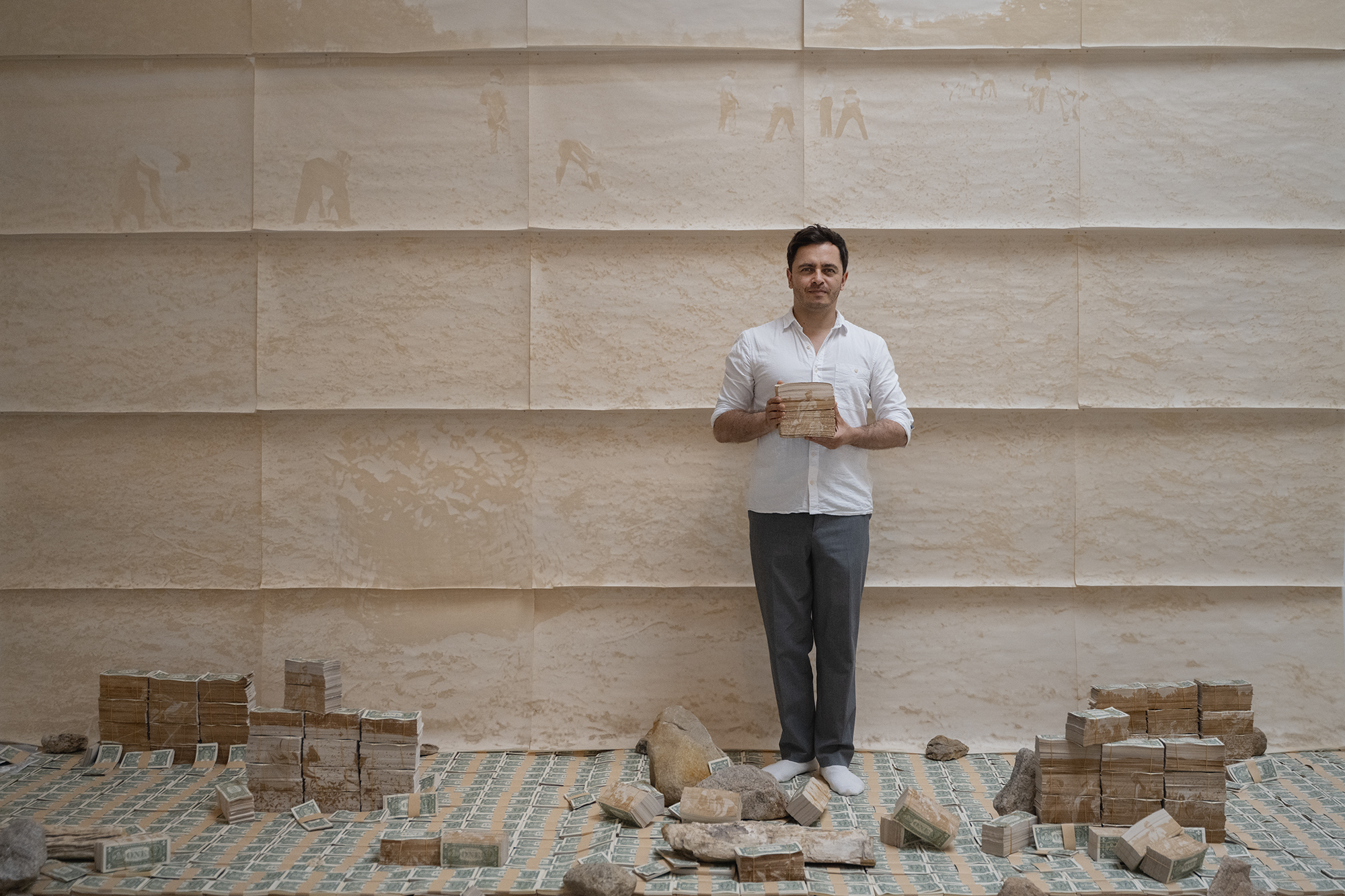 Portrait of David Guarnizo with his MFA Thesis Installation at ICA