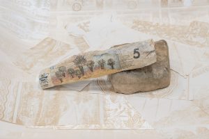 Found wood with image of columbian money transferred onto it